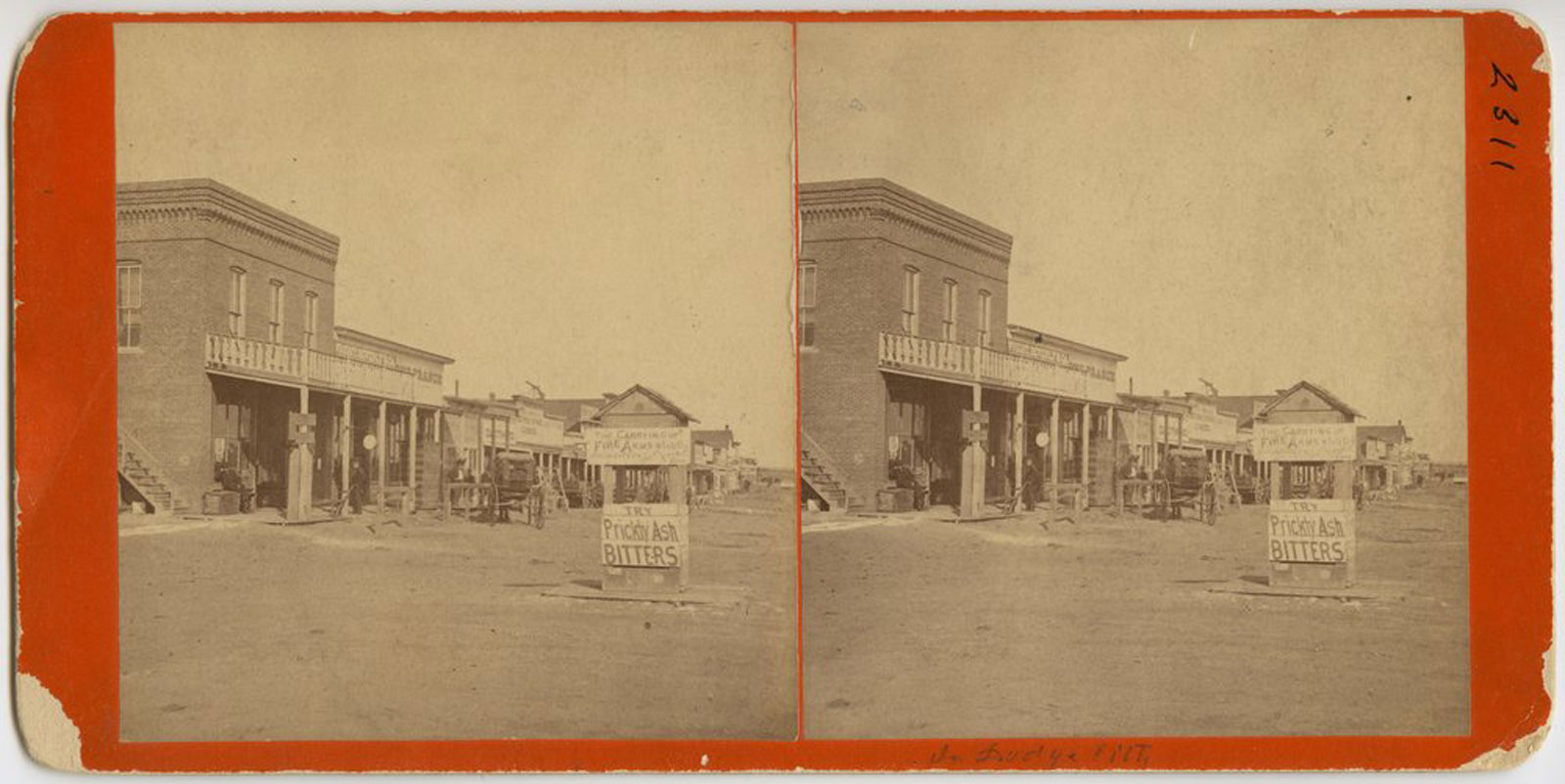It’s a bit hard to read, but the sign to the right of this view of Dodge City, Kansas, from 1878 reads ‘The carrying of firearms strictly prohibited.’ 