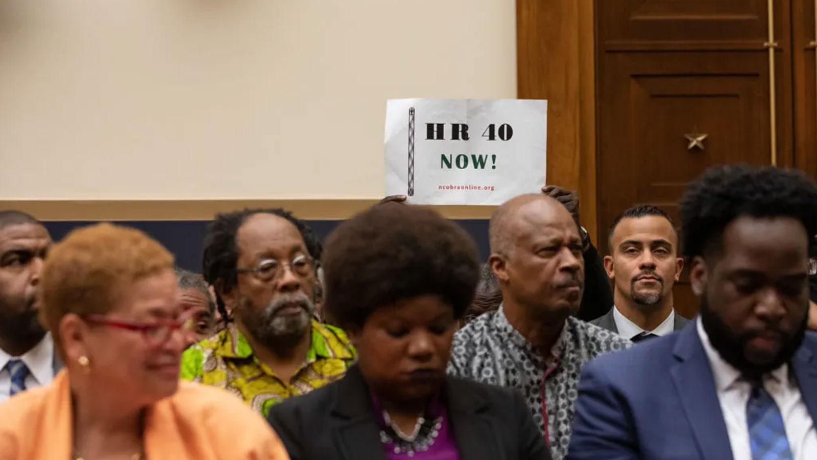 Attendees representing various groups at the 2019 Congressional hearing on reparations.