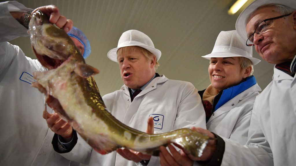 Boris Johnson holding fish