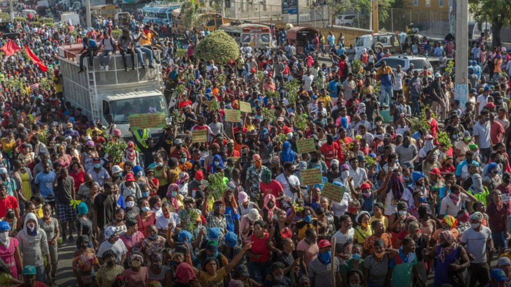 The mass protest by garment workers on Feb. 17, 2022, in Port-au-Prince, Haiti, won a 54% wage increase.