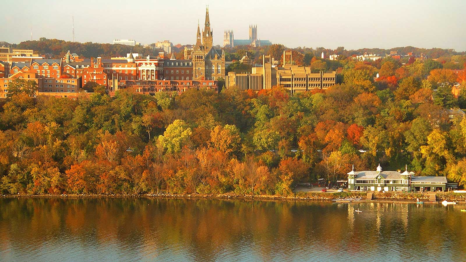 Georgetown University's main campus taken from the top floor of the Key Bridge Marriott. Washington National Cathedral is visible above campus, and the Washington Canoe Club is in the lower right, on the Potomac River