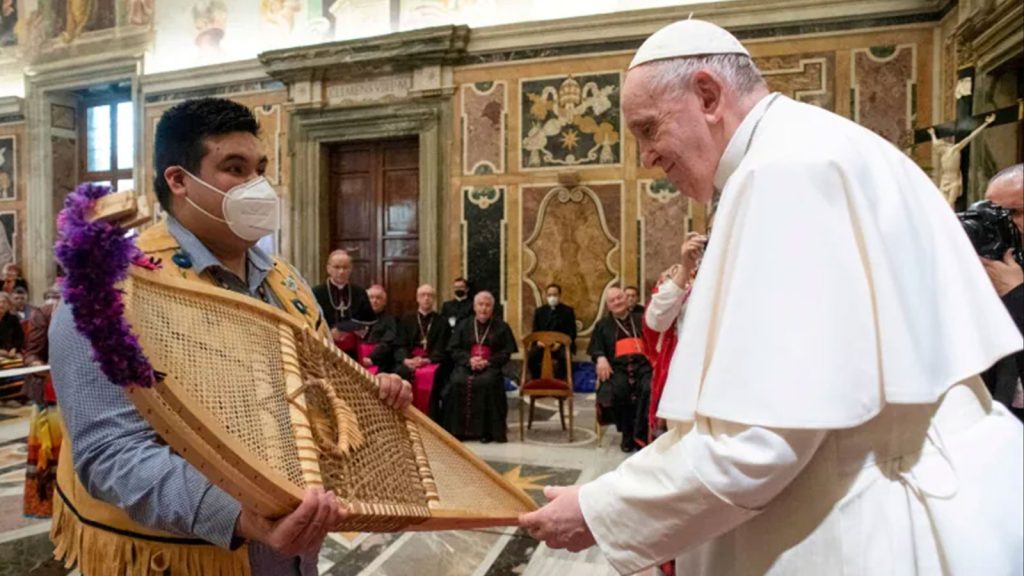 Traditional handmade snowshoes are presented to Pope Francis by Adrian Gunner, from the Assembly of First Nations delegation in the spring when First Nations, Inuit and Métis visited the Vatican to discuss the harm caused by residential schools. The Pope is expected to make another, potentially broader, apology during his visit to Indigenous communities in Canada next week.