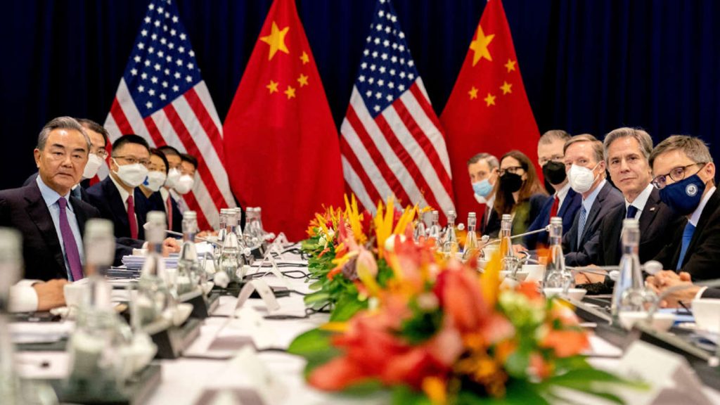 U.S. Secretary of State Antony Blinken (2nd right) and China's Foreign Minister Wang Yi (left) attend a meeting in Nusa Dua on the Indonesian resort island of Bali on July 9, 2022.