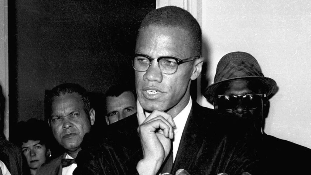 Malcolm X speaks to reporters in Washington, D.C., on May 16, 1963
