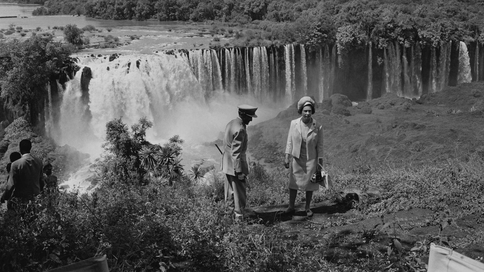 Queen Elizabeth II at the Tissisal Falls, where the Blue Nile begins, with Emperor Haile Selassie during a royal visit to Ethiopia, Feb. 7, 1965. 