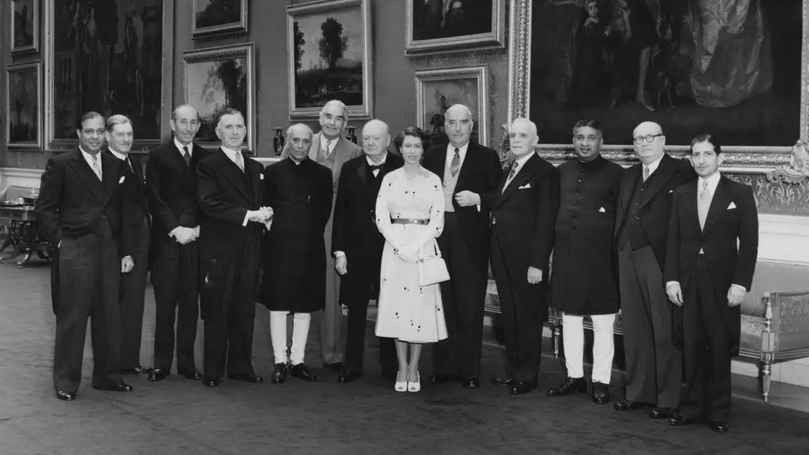 Queen Elizabeth II with representatives of the Commonwealth in 1953. As head of state, she put a stolid traditionalist front over decades of violent upheaval.