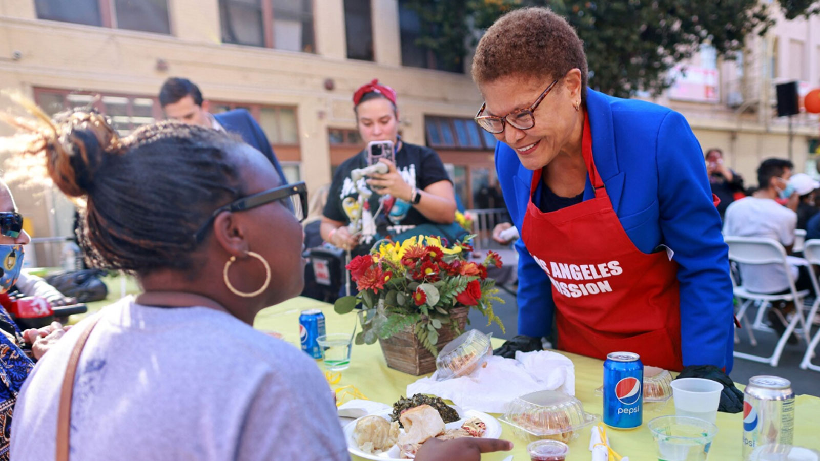 Los Angeles Mayor-elect Karen Bass volunteers at a meal distribution for people in need on the eve of Thanksgiving at the L.A. Mission in Los Angeles on Nov. 23. 