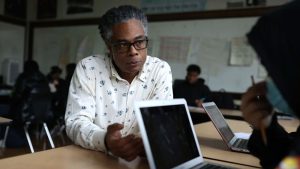 Marcus Walker is a teacher at Fenway High School, where he teaches an 11th-grade humanities class.