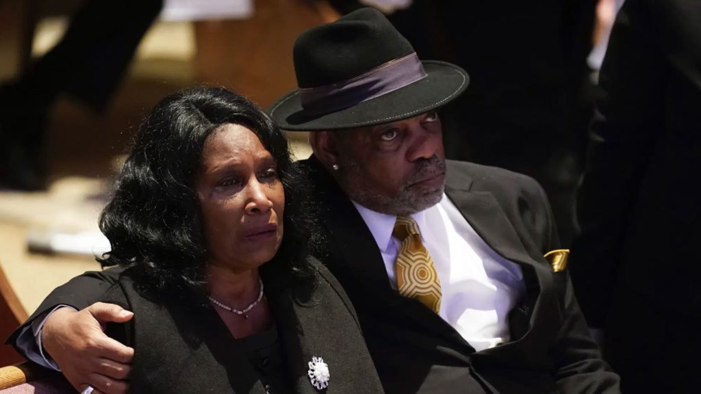 Row Vaughn Wells cries as she and her husband Rodney Wells attend the funeral service for her son Tyre Nichols at Mississippi Boulevard Christian Church in Memphis, Tenn., on Wednesday, Feb. 1, 2023. Nichols died following a brutal beating by Memphis police after a traffic stop.