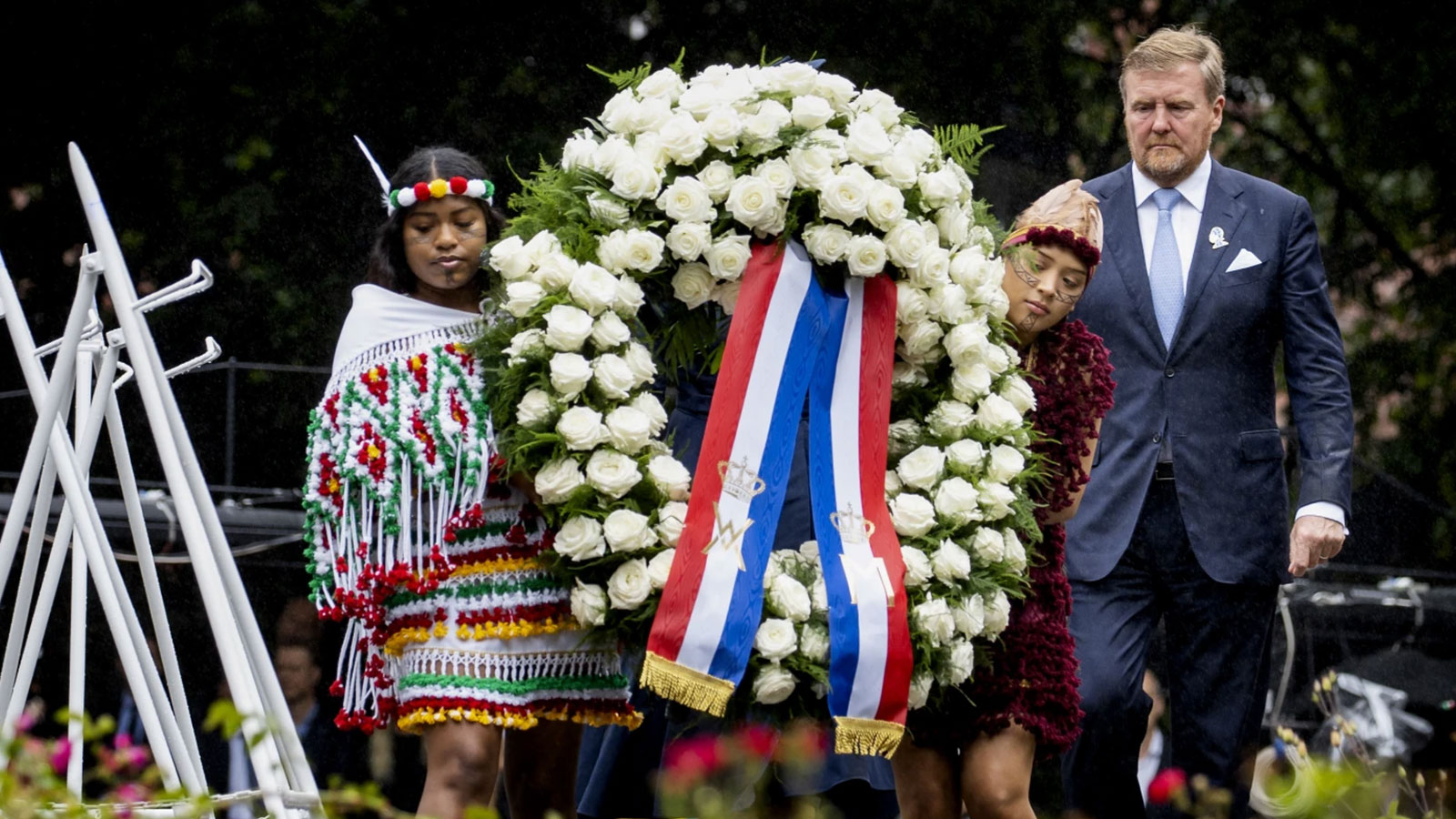 Dutch King Willem-Alexander lays a wreath at the slavery monument after apologising for the royal house’s role in slavery and asked forgiveness in a speech greeted by cheers and whoops at an event to commemorate the anniversary of the country abolishing slavery in Amsterdam, Netherlands, Saturday, July 1, 2023.