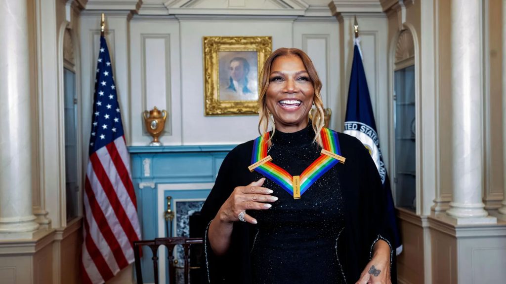 Kennedy Center Honoree Queen Latifah enjoys a moment following the gala dinner at the State Department on Dec. 2.