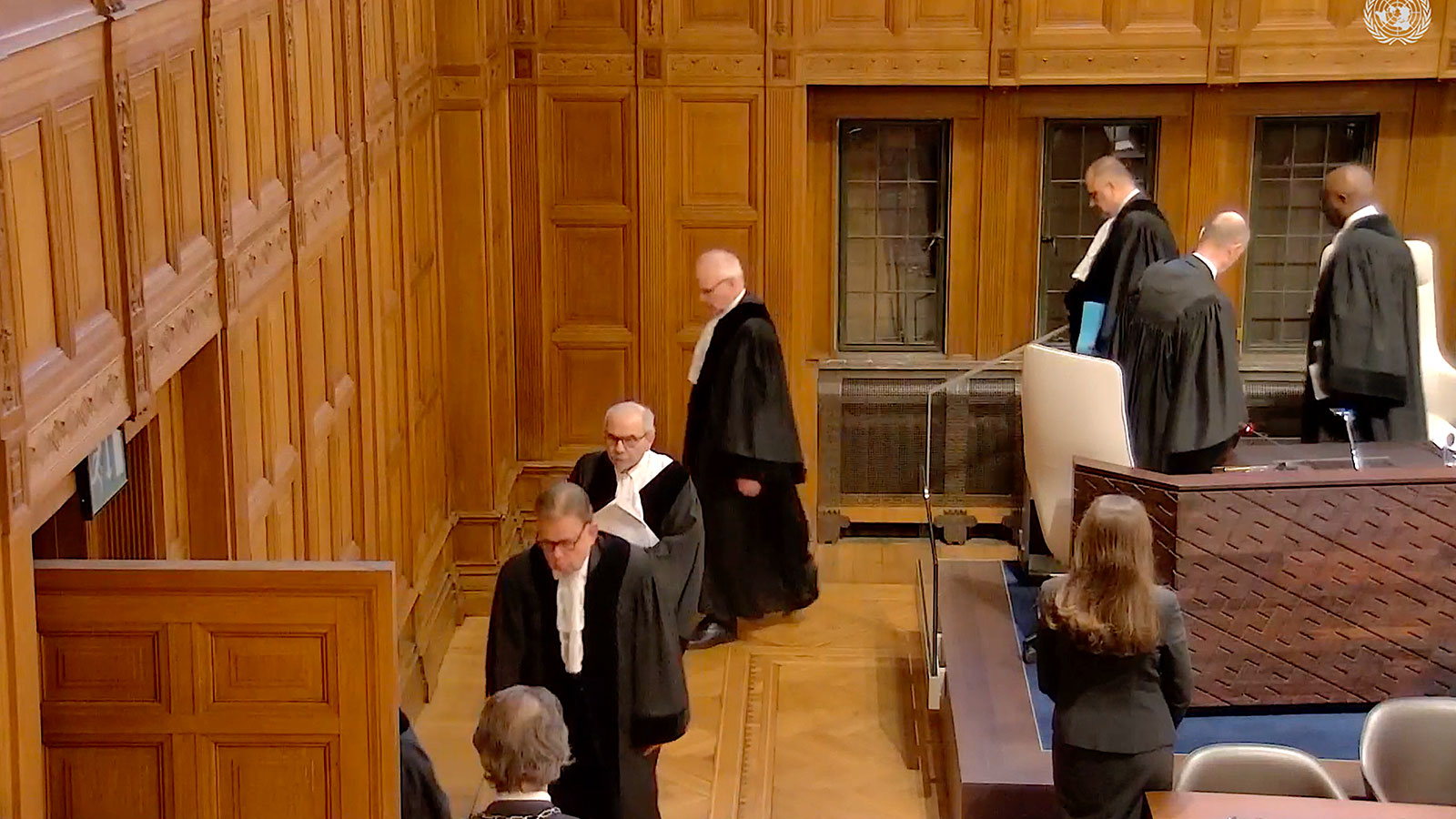 Judges leaving the courtroom at conclusion of Thursday’s hearing. (UN TV screenshot)