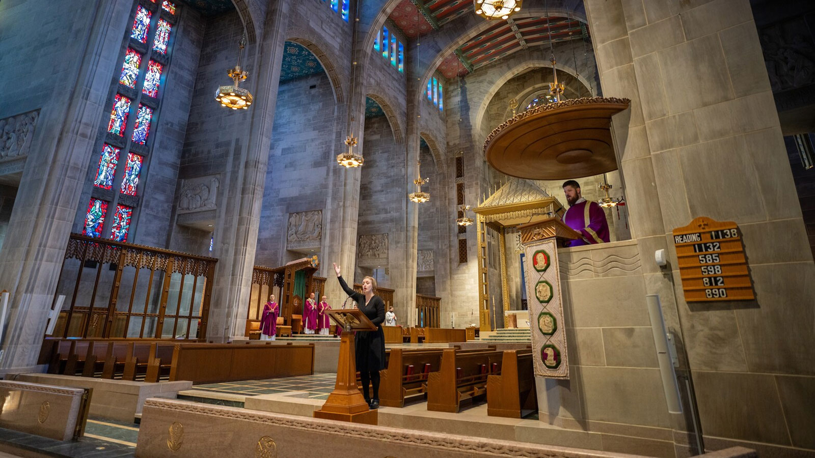 A song is performed during a Catholic Mass at the Cathedral of Mary Our Queen in Baltimore for those impacted by the collapse of the Key Bridge.
