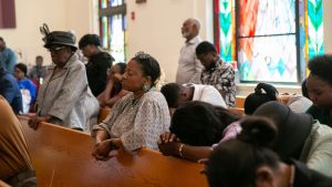 Parishioners worship at Sunday morning Mass at Notre Dame d'Haiti Catholic Church in Miami's Little Haiti on March 17, 2024.