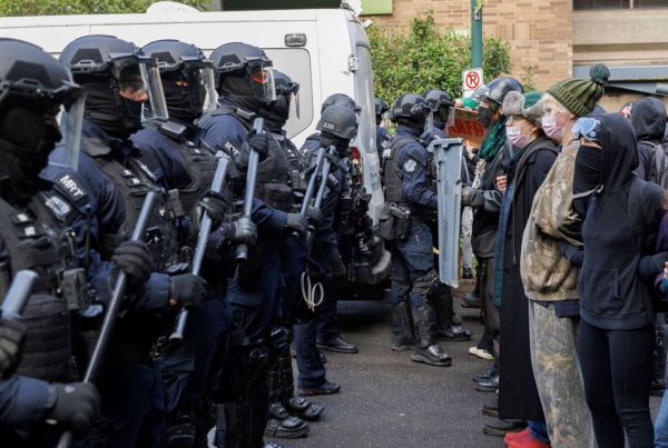 Police and pro-Palestinian students face off during a demonstration on the campus of Portland State University in Portland, Ore., on May 2, 2024.