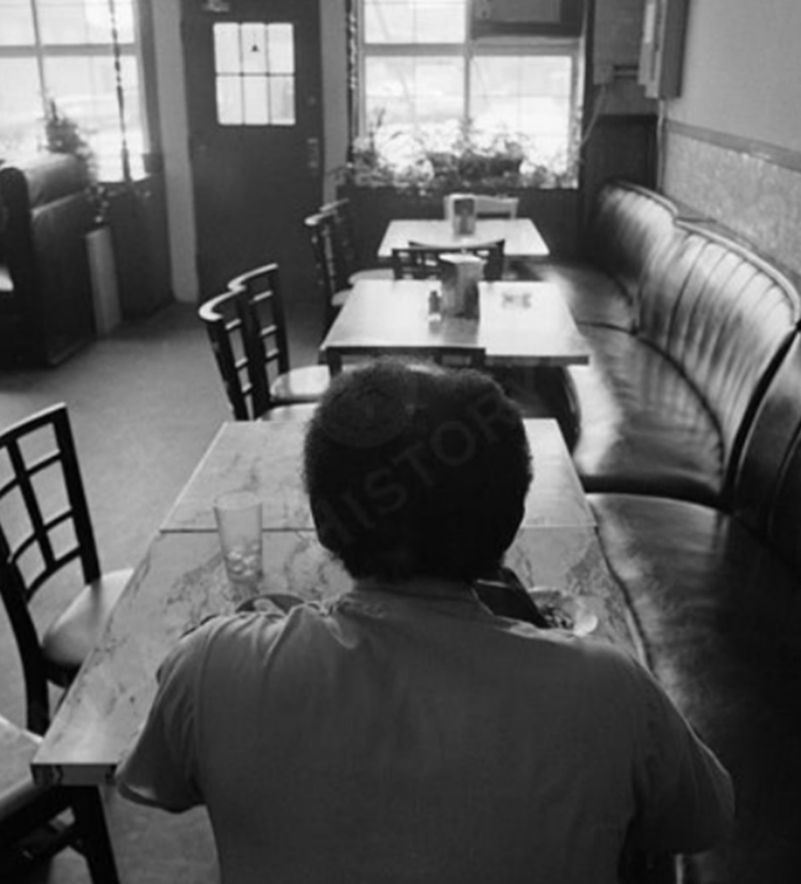 View of an unidentified individual eating at Shepherd’s Restaurant on Butler Street. Boyd Lewis, Boyd Lewis Photographs, Kenan Research Center at Atlanta History Center
