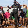 Members of Ghetto Kids rehearse a dance routine with Ugandan musician Edrisah Musuuza, also known as Eddy Kenzo, in Makindye, a suburb in Kampala, Uganda, on 20 January 2023.