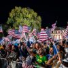 WASHINGTON, DC – NOVEMBER 05: Supporters wave flags during an election night event held by Democratic presidential nominee, U.S. Vice President Kamala Harris at Howard University on November 05, 2024 in Washington, DC. Americans cast their ballots today in the presidential race between Republican nominee former President Donald Trump and Vice President Kamala Harris, as well as multiple state elections that will determine the balance of power in Congress.