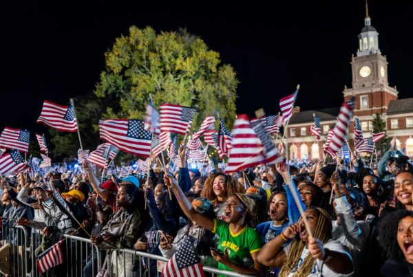 WASHINGTON, DC – NOVEMBER 05: Supporters wave flags during an election night event held by Democratic presidential nominee, U.S. Vice President Kamala Harris at Howard University on November 05, 2024 in Washington, DC. Americans cast their ballots today in the presidential race between Republican nominee former President Donald Trump and Vice President Kamala Harris, as well as multiple state elections that will determine the balance of power in Congress.