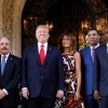 U.S. President Trump and first lady Melania Trump pose before a meeting with St Lucia Prime Minister Allen Chastanet, Dominican Republic President Danilo Medina, Jamaica Prime Minister Andrew Holness, Haiti President Jovenel Moise and Bahamas PM.