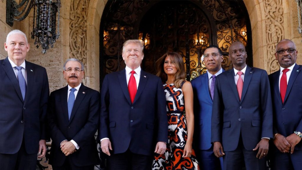 U.S. President Trump and first lady Melania Trump pose before a meeting with St Lucia Prime Minister Allen Chastanet, Dominican Republic President Danilo Medina, Jamaica Prime Minister Andrew Holness, Haiti President Jovenel Moise and Bahamas PM.