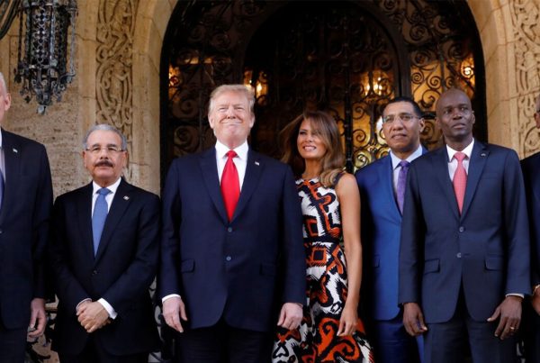 U.S. President Trump and first lady Melania Trump pose before a meeting with St Lucia Prime Minister Allen Chastanet, Dominican Republic President Danilo Medina, Jamaica Prime Minister Andrew Holness, Haiti President Jovenel Moise and Bahamas PM.