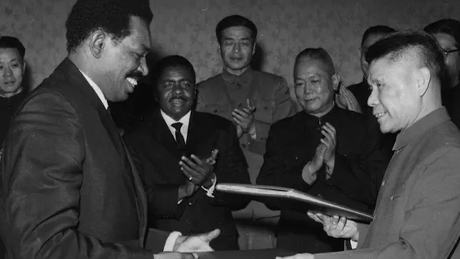 Babu, who became a life-long Malcolm friend, shown with Chinese officials.
