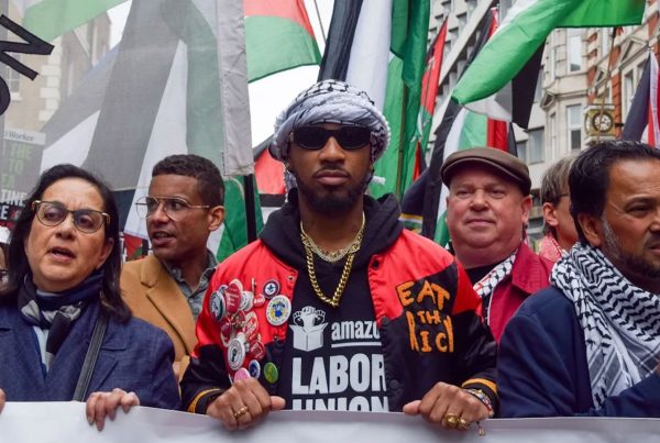 Chris Smalls, center, president of the Amazon Labor Union, takes part in a march in solidarity with Palestinians demanding a cease-fire in Gaza, June 8, 2024, in London.