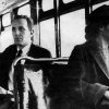 Rosa Parks riding a Montgomery bus immediately following the decision to desegregate buses. (Wikipedia)