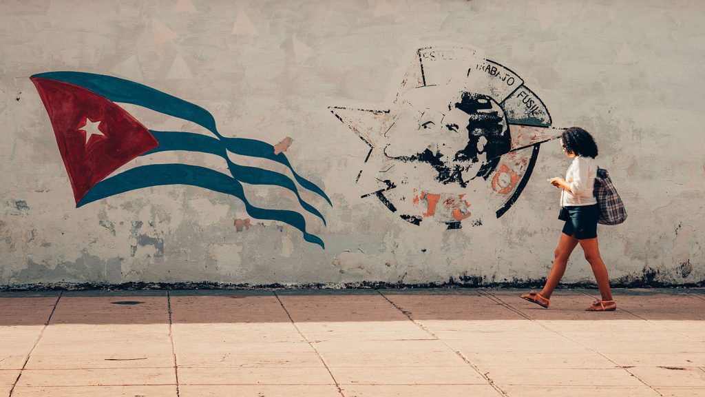 Contemporary Cuban street scene with public art.