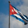 Cuban flag flying against the sky.