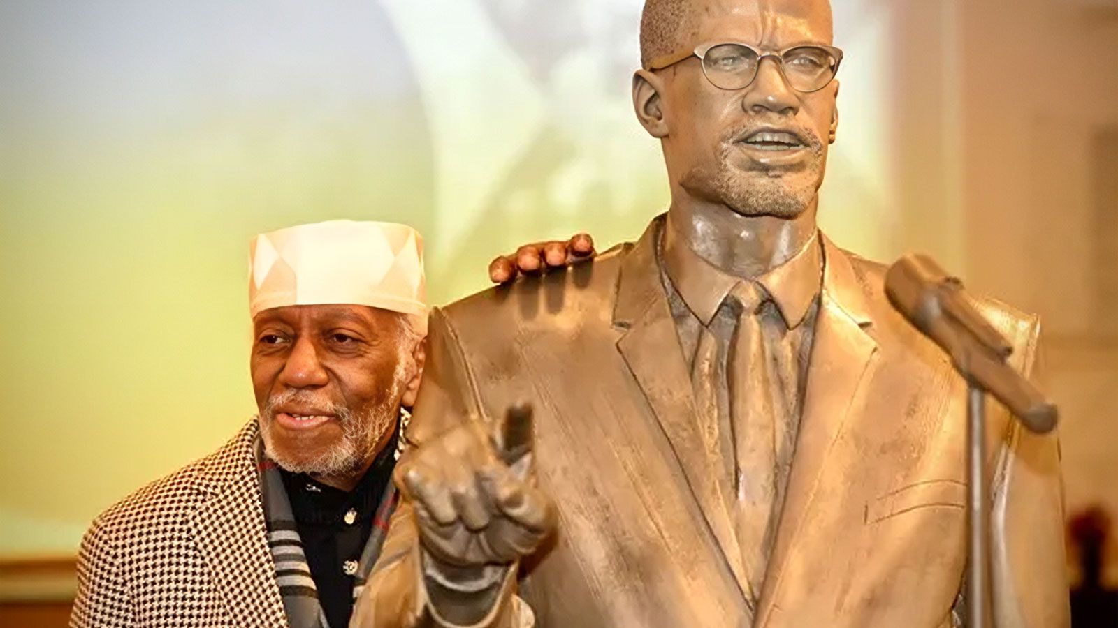 Holding Malcolm X’s hand and remembering his energy
