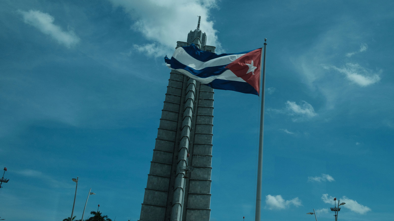 Cuban flag flying over Havana, Cuba.