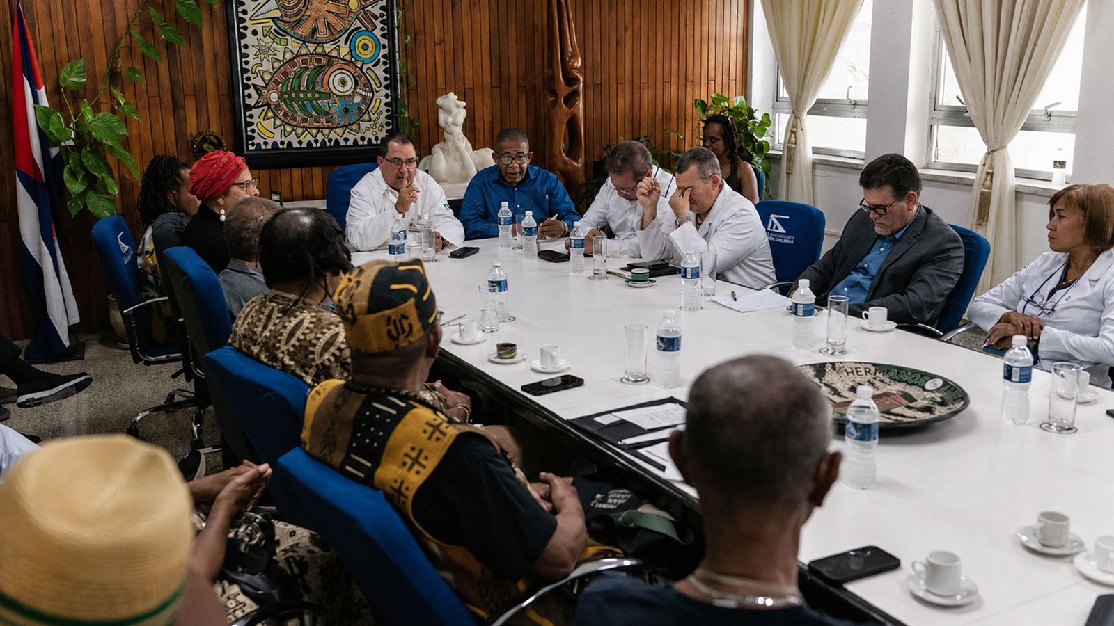 Members of the IBW/PAUD delegation meet with medical professionals at Hospital Clínico Quirúrgico Hermanos Ameijeiras.
