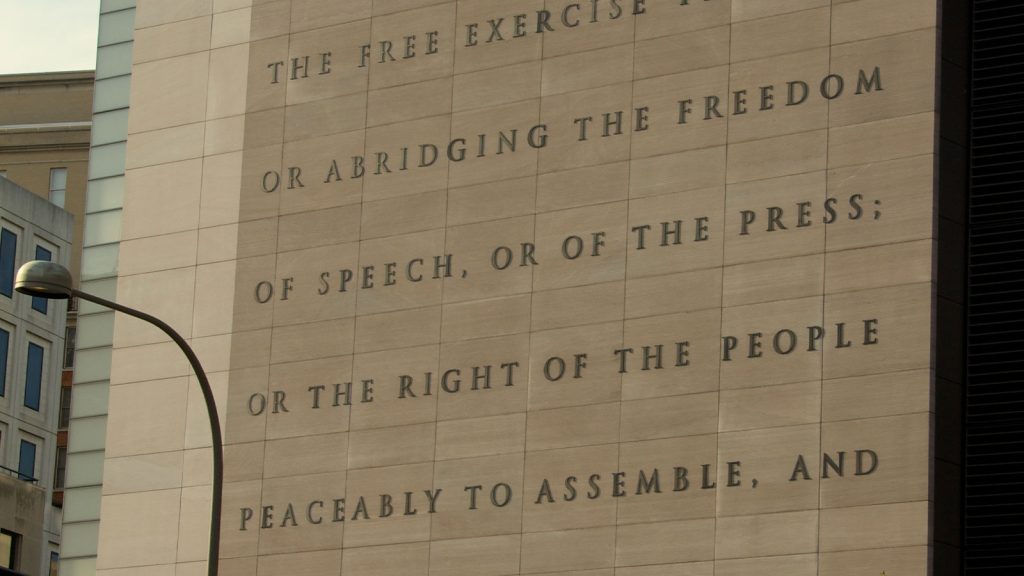 The First Amendment engraved on the former Newseum building in Washington, D.C., highlighting protections for freedom of speech and the press.