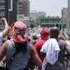 Protesters marching through a street in Johannesburg, South Africa